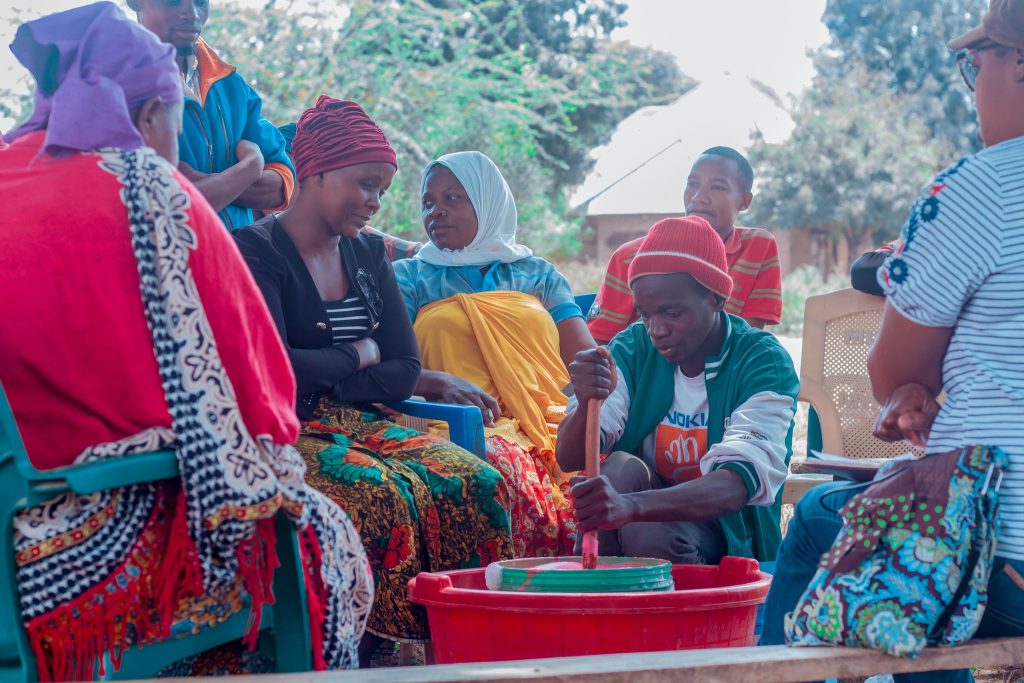 TRAINING OUR COMMUNITIES IN DISH WASHING SOAP MAKING.